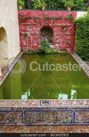 To use this stock image in your creative project, please select the size you need over to the right and click the "Add to Cart" button.
Your downloaded image will come with the Cutcaster watermark removed so don’t worry about the watermark you see on this page. Green Pool Reflection Mosaic Wall Garden Alcazar Royal Palace Se stock photo, Green Pool Basin Reflection Mosaic Wall Garden Alcazar Royal Palace Seville Andalusia Spain. Originally a Moorish Fort, oldest Royal Palace still in use in Europe. Built in the 1100s and rebuilt in the 1300s. by William Perry
