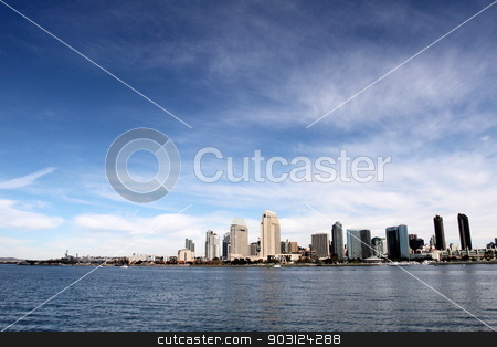 To use this stock image in your creative project, please select the size you need over to the right and click the "Add to Cart" button.
Your downloaded image will come with the Cutcaster watermark removed so don’t worry about the watermark you see on this page. Skyline San Diego stock photo, The skyline of San Diego with water in the front and cloudy blue sky in the background. by Henrik Lehnerer