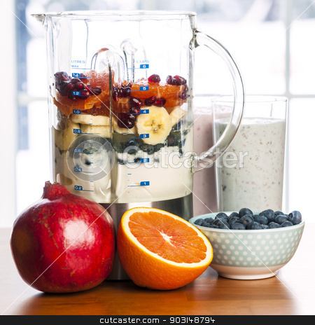 To use this stock image in your creative project, please select the size you need over to the right and click the "Add to Cart" button.
Your downloaded image will come with the Cutcaster watermark removed so don’t worry about the watermark you see on this page. Making smoothies in blender with fruit and yogurt stock photo, Prepared smoothies and healthy smoothie ingredients in blender with fresh fruit ready to blend on kitchen table by Elena Elisseeva