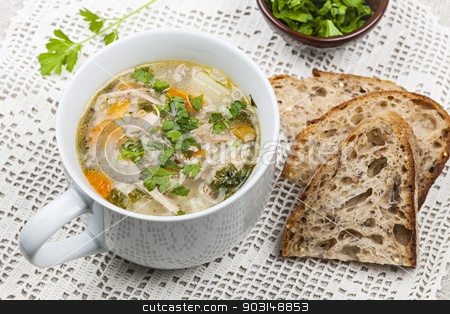 To use this stock image in your creative project, please select the size you need over to the right and click the "Add to Cart" button.
Your downloaded image will come with the Cutcaster watermark removed so don’t worry about the watermark you see on this page. Cup of chicken rice soup stock photo, Cup of hot chicken rice soup served with bread and parsley on crochet tablecloth by Elena Elisseeva