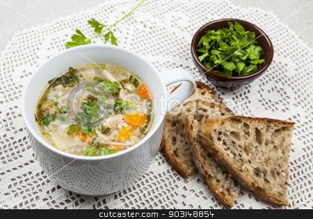 To use this stock image in your creative project, please select the size you need over to the right and click the "Add to Cart" button.
Your downloaded image will come with the Cutcaster watermark removed so don’t worry about the watermark you see on this page. Cup of chicken rice soup stock photo, Cup of hot chicken rice soup served with bread and parsley on crochet tablecloth by Elena Elisseeva