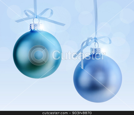 To use this stock image in your creative project, please select the size you need over to the right and click the "Add to Cart" button.
Your downloaded image will come with the Cutcaster watermark removed so don’t worry about the watermark you see on this page. Two Christmas ornaments stock photo, Two Christmas decorations hanging on ribbons with blue background by Elena Elisseeva