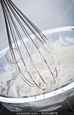 To use this stock image in your creative project, please select the size you need over to the right and click the "Add to Cart" button.
Your downloaded image will come with the Cutcaster watermark removed so don’t worry about the watermark you see on this page. Whisk in whipped cream stock photo, Closeup of metal whisk whipping cream in glass bowl by Elena Elisseeva