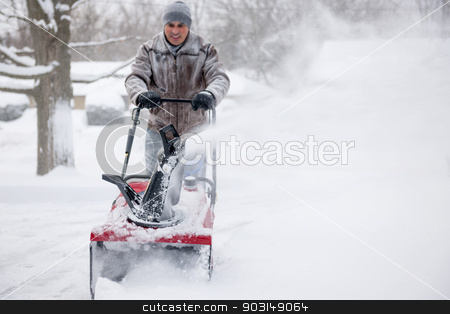 To use this stock image in your creative project, please select the size you need over to the right and click the "Add to Cart" button.
Your downloaded image will come with the Cutcaster watermark removed so don’t worry about the watermark you see on this page. Man using snowblower in deep snow stock photo, Man using snowblower to clear deep snow on residential driveway after heavy snowfall by Elena Elisseeva