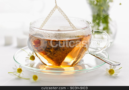 To use this stock image in your creative project, please select the size you need over to the right and click the "Add to Cart" button.
Your downloaded image will come with the Cutcaster watermark removed so don’t worry about the watermark you see on this page. Herbal tea in glass cup stock photo, Glass teacup with soothing herbal tea in silk bag by Elena Elisseeva