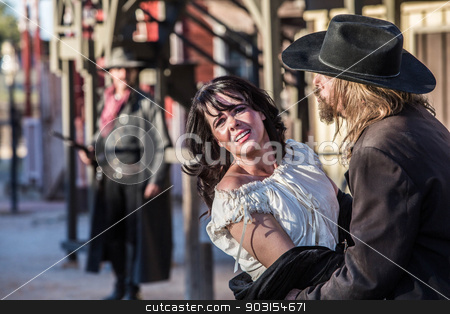 To use this stock image in your creative project, please select the size you need over to the right and click the "Add to Cart" button.
Your downloaded image will come with the Cutcaster watermark removed so don’t worry about the watermark you see on this page. Old West Trio stock photo, Woman has been captured by old west bandit by Scott Griessel
