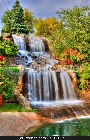 To use this stock image in your creative project, please select the size you need over to the right and click the "Add to Cart" button.
Your downloaded image will come with the Cutcaster watermark removed so don’t worry about the watermark you see on this page. Silky Waterfall in High Dynamic Range stock photo, Steams of misty water fall down the hill in High Dynamic Range by Joseph Fuller