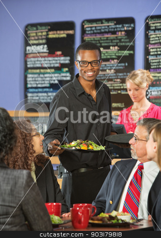 To use this stock image in your creative project, please select the size you need over to the right and click the "Add to Cart" button.
Your downloaded image will come with the Cutcaster watermark removed so don’t worry about the watermark you see on this page. Serving Customers Food stock photo, Smiling handsome cafe waiter bringing customers food by Scott Griessel