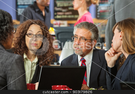To use this stock image in your creative project, please select the size you need over to the right and click the "Add to Cart" button.
Your downloaded image will come with the Cutcaster watermark removed so don’t worry about the watermark you see on this page. Business Man and Women in Cafe stock photo, Business people at a power lunch with laptop by Scott Griessel