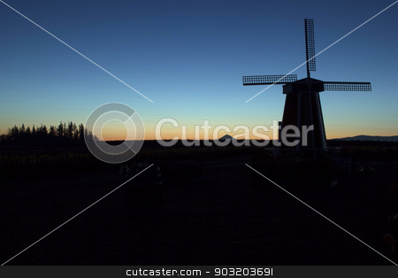 To use this stock image in your creative project, please select the size you need over to the right and click the "Add to Cart" button.
Your downloaded image will come with the Cutcaster watermark removed so don’t worry about the watermark you see on this page. Silhouette of Windmill at Sunrise stock photo, Silhouette of Windmill with Mt Hood in the Distance at Tulip Field in Woodburn Oregon During Sunrise by Jit Lim