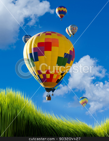 To use this stock image in your creative project, please select the size you need over to the right and click the "Add to Cart" button.
Your downloaded image will come with the Cutcaster watermark removed so don’t worry about the watermark you see on this page. Hot Air Balloons. stock photo, Hot air balloons flying high over green grass. by WScott