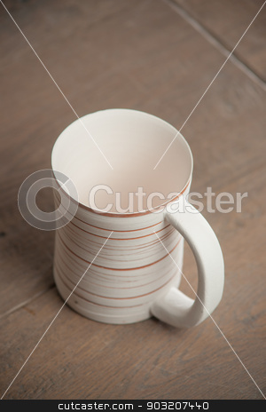 To use this stock image in your creative project, please select the size you need over to the right and click the "Add to Cart" button.
Your downloaded image will come with the Cutcaster watermark removed so don’t worry about the watermark you see on this page. Traditional handcrafted mug stock photo, Traditional handcrafted mug - perfect for tea, coffee or beer by Alexey Kozak