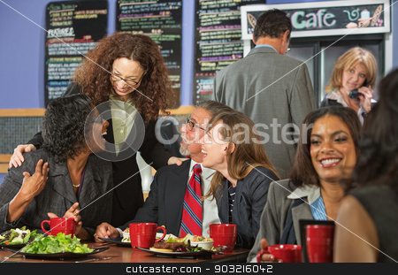 To use this stock image in your creative project, please select the size you need over to the right and click the "Add to Cart" button.
Your downloaded image will come with the Cutcaster watermark removed so don’t worry about the watermark you see on this page. Friends Joking During Lunch stock photo, Diverse group of mature friends laughing during lunch by Scott Griessel