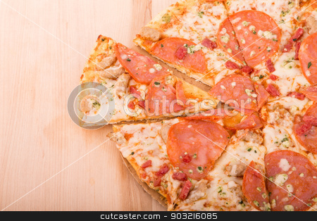 To use this stock image in your creative project, please select the size you need over to the right and click the "Add to Cart" button.
Your downloaded image will come with the Cutcaster watermark removed so don’t worry about the watermark you see on this page. Sliced Pepperoni Pizza on Wood Cutting Board with Copy Space stock photo, Ahot cheesy pepperoni pizza on a wood cutting board with room for copy space by Darryl Brooks