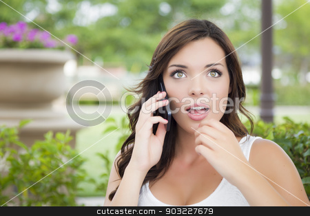 To use this stock image in your creative project, please select the size you need over to the right and click the "Add to Cart" button.
Your downloaded image will come with the Cutcaster watermark removed so don’t worry about the watermark you see on this page. Stunned Young Adult Female Talking on Cell Phone Outdoors stock photo, Shocked Young Adult Female Talking on Cell Phone Outdoors on Bench. by Andy Dean