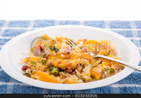 To use this stock image in your creative project, please select the size you need over to the right and click the "Add to Cart" button.
Your downloaded image will come with the Cutcaster watermark removed so don’t worry about the watermark you see on this page. Bowl of Has Brown Potatoes with Ham Broccoli and Cheese stock photo, Casserole of hash brown potatoes, ham and broccoli with cheese by Darryl Brooks