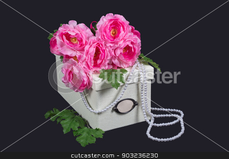 To use this stock image in your creative project, please select the size you need over to the right and click the "Add to Cart" button.
Your downloaded image will come with the Cutcaster watermark removed so don’t worry about the watermark you see on this page. White box, pink flowers and pearl beads stock photo, White box, pink flowers and pearl beads on gray by AntMishch