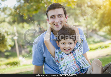 To use this stock image in your creative project, please select the size you need over to the right and click the "Add to Cart" button.
Your downloaded image will come with the Cutcaster watermark removed so don’t worry about the watermark you see on this page. Handsome Mixed Race Father and Son Park Portrait stock photo, Handsome Mixed Race Father and Young Son Portrait in the Park. by Andy Dean