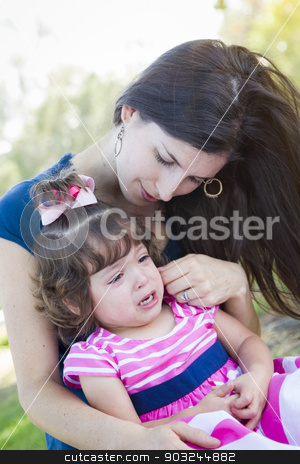 To use this stock image in your creative project, please select the size you need over to the right and click the "Add to Cart" button.
Your downloaded image will come with the Cutcaster watermark removed so don’t worry about the watermark you see on this page. Loving Mother Consoles Crying Baby Daughter stock photo, Mixed Race Loving Mother Consoles Her Crying Baby Daughter in Park. by Andy Dean