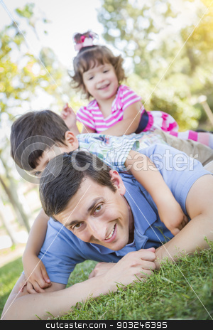 To use this stock image in your creative project, please select the size you need over to the right and click the "Add to Cart" button.
Your downloaded image will come with the Cutcaster watermark removed so don’t worry about the watermark you see on this page. Young Son and Daughter Having Fun With Their Dad Outdoors stock photo, Young Son and Baby Daughter Having Fun With Their Dad Outdoors. by Andy Dean