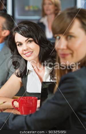To use this stock image in your creative project, please select the size you need over to the right and click the "Add to Cart" button.
Your downloaded image will come with the Cutcaster watermark removed so don’t worry about the watermark you see on this page. Business Woman in Cafe stock photo, Cheerful young white female with friend in cafe by Scott Griessel