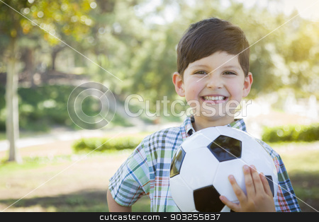 To use this stock image in your creative project, please select the size you need over to the right and click the "Add to Cart" button.
Your downloaded image will come with the Cutcaster watermark removed so don’t worry about the watermark you see on this page. Cute Young Boy Playing with Soccer Ball in Park stock photo, Cute Young Boy Playing with Soccer Ball Outdoors in the Park. by Andy Dean