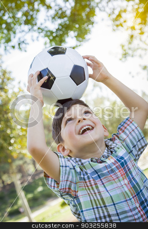 To use this stock image in your creative project, please select the size you need over to the right and click the "Add to Cart" button.
Your downloaded image will come with the Cutcaster watermark removed so don’t worry about the watermark you see on this page. Cute Young Boy Playing with Soccer Ball in Park stock photo, Cute Young Boy Playing with Soccer Ball Outdoors in the Park. by Andy Dean