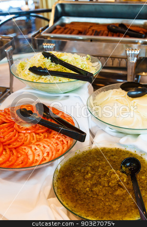 To use this stock image in your creative project, please select the size you need over to the right and click the "Add to Cart" button.
Your downloaded image will come with the Cutcaster watermark removed so don’t worry about the watermark you see on this page. Condiments for Hot Dogs stock photo, Condiments for hamburgers and hot dogs on a buffet by Darryl Brooks