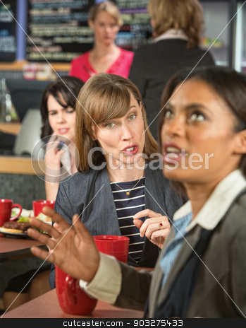 To use this stock image in your creative project, please select the size you need over to the right and click the "Add to Cart" button.
Your downloaded image will come with the Cutcaster watermark removed so don’t worry about the watermark you see on this page. Bothering Coworker at Lunch stock photo, Woman bothering coworker in cafeteria at work by Scott Griessel