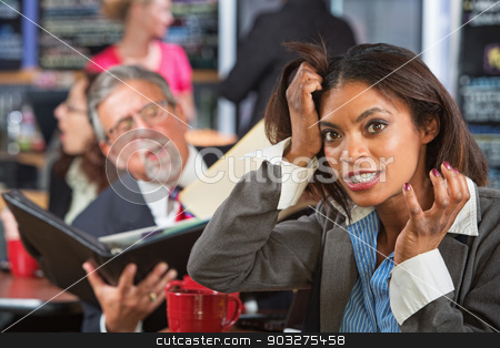 To use this stock image in your creative project, please select the size you need over to the right and click the "Add to Cart" button.
Your downloaded image will come with the Cutcaster watermark removed so don’t worry about the watermark you see on this page. Annoyed Female Pulling Hair stock photo, Annoying business man reading to woman pulling her hair by Scott Griessel