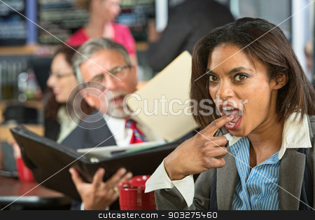 To use this stock image in your creative project, please select the size you need over to the right and click the "Add to Cart" button.
Your downloaded image will come with the Cutcaster watermark removed so don’t worry about the watermark you see on this page. Disgusted Worker with Man stock photo, Disgusted business woman gagging while man reads to her by Scott Griessel
