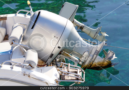 To use this stock image in your creative project, please select the size you need over to the right and click the "Add to Cart" button.
Your downloaded image will come with the Cutcaster watermark removed so don’t worry about the watermark you see on this page. Motorboat engine stock photo, Photo of a grey motorboat engine in the sea by Nneirda