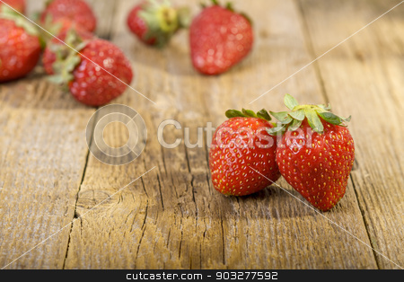 To use this stock image in your creative project, please select the size you need over to the right and click the "Add to Cart" button.
Your downloaded image will come with the Cutcaster watermark removed so don’t worry about the watermark you see on this page. Fresh strawberries on wooden table stock photo, Fresh strawberries on wooden table. Focus on first two strawberries by manaemedia