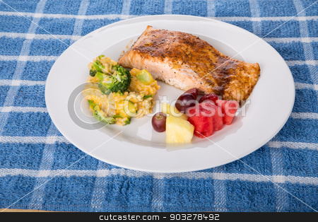 To use this stock image in your creative project, please select the size you need over to the right and click the "Add to Cart" button.
Your downloaded image will come with the Cutcaster watermark removed so don’t worry about the watermark you see on this page. Baked Salmon with Broccoli Rice and Fresh Fruit stock photo, A plate of fresh, baked salmon with a broccoli, cheese and rice casserole and fresh cut fruit by Darryl Brooks