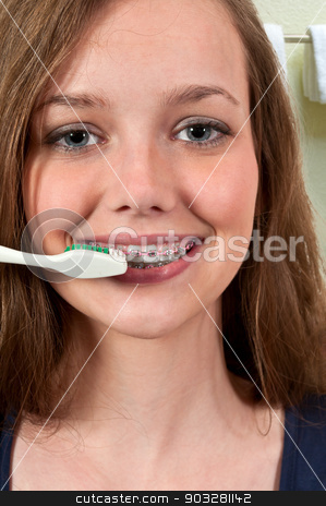 To use this stock image in your creative project, please select the size you need over to the right and click the "Add to Cart" button.
Your downloaded image will come with the Cutcaster watermark removed so don’t worry about the watermark you see on this page. Beautiful Teenage Woman Brushing Teeth stock photo, Beautiful teenage woman practicing good oral dental care by brushing her teeth by Robert Byron
