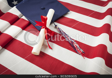 To use this stock image in your creative project, please select the size you need over to the right and click the "Add to Cart" button.
Your downloaded image will come with the Cutcaster watermark removed so don’t worry about the watermark you see on this page. Graduation Cap and Diploma Resting on American Flag stock photo, Graduation Cap with Tassel and Red Ribbon Wrapped Diploma Resting on American Flag. by Andy Dean