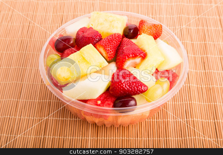 To use this stock image in your creative project, please select the size you need over to the right and click the "Add to Cart" button.
Your downloaded image will come with the Cutcaster watermark removed so don’t worry about the watermark you see on this page. Cut Fruit in Clear Bowl stock photo, A plastic bowl of fresh cut fruit by Darryl Brooks