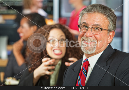 To use this stock image in your creative project, please select the size you need over to the right and click the "Add to Cart" button.
Your downloaded image will come with the Cutcaster watermark removed so don’t worry about the watermark you see on this page. Naive Businessman stock photo, Angry woman trying to strangle naive businessman by Scott Griessel