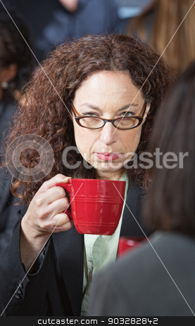 To use this stock image in your creative project, please select the size you need over to the right and click the "Add to Cart" button.
Your downloaded image will come with the Cutcaster watermark removed so don’t worry about the watermark you see on this page. Offended Business Woman stock photo, Offended businesswoman with friend holding coffee cup by Scott Griessel