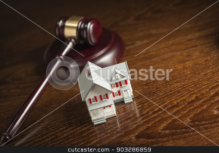 To use this stock image in your creative project, please select the size you need over to the right and click the "Add to Cart" button.
Your downloaded image will come with the Cutcaster watermark removed so don’t worry about the watermark you see on this page. Gavel and Small Model House on Table stock photo, Gavel and Small Model House on Wooden Table. by Andy Dean