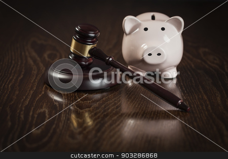 To use this stock image in your creative project, please select the size you need over to the right and click the "Add to Cart" button.
Your downloaded image will come with the Cutcaster watermark removed so don’t worry about the watermark you see on this page. Gavel and Piggy Bank on Table stock photo, Gavel and Piggy Bank on Wooden Table. by Andy Dean