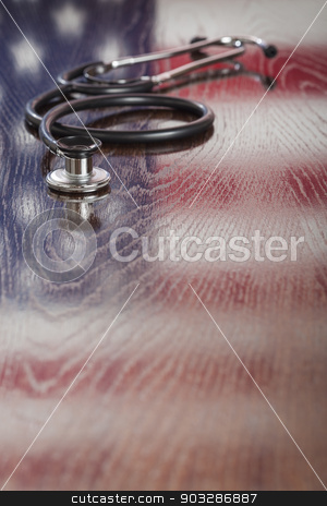 To use this stock image in your creative project, please select the size you need over to the right and click the "Add to Cart" button.
Your downloaded image will come with the Cutcaster watermark removed so don’t worry about the watermark you see on this page. Stethoscope with American Flag Reflection on Table stock photo, Stethoscope with American Flag Reflection on Wooden Table. by Andy Dean