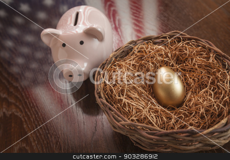 To use this stock image in your creative project, please select the size you need over to the right and click the "Add to Cart" button.
Your downloaded image will come with the Cutcaster watermark removed so don’t worry about the watermark you see on this page. Golden Egg, Nest and Piggy Bank with American Flag Reflection stock photo, Golden Egg in Nest and Piggy Bank with American Flag Reflection on Wooden Table. by Andy Dean