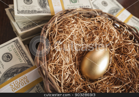 To use this stock image in your creative project, please select the size you need over to the right and click the "Add to Cart" button.
Your downloaded image will come with the Cutcaster watermark removed so don’t worry about the watermark you see on this page. Golden Egg in Nest and Thousands of Dollars Surrounding stock photo, Golden Egg in Nest with Thousands of Dollars on Table. by Andy Dean