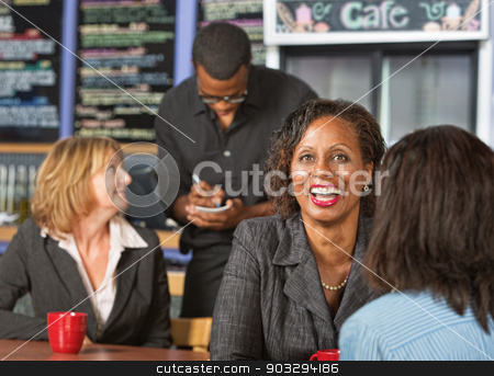 To use this stock image in your creative project, please select the size you need over to the right and click the "Add to Cart" button.
Your downloaded image will come with the Cutcaster watermark removed so don’t worry about the watermark you see on this page. Cute Lady Laughing stock photo, Cute laughing mature business woman with friend in cafe by Scott Griessel