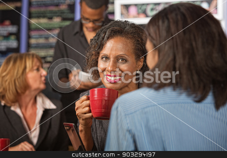 To use this stock image in your creative project, please select the size you need over to the right and click the "Add to Cart" button.
Your downloaded image will come with the Cutcaster watermark removed so don’t worry about the watermark you see on this page. Glad Woman Drinking Tea stock photo, Beautiful business woman holding red coffee mug by Scott Griessel
