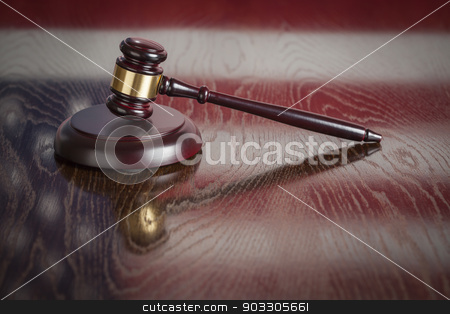To use this stock image in your creative project, please select the size you need over to the right and click the "Add to Cart" button.
Your downloaded image will come with the Cutcaster watermark removed so don’t worry about the watermark you see on this page. Wooden Gavel Resting on Flag Reflecting Table stock photo, Wooden Gavel Resting on American Flag Reflecting Table. by Andy Dean