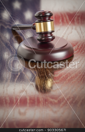 To use this stock image in your creative project, please select the size you need over to the right and click the "Add to Cart" button.
Your downloaded image will come with the Cutcaster watermark removed so don’t worry about the watermark you see on this page. Wooden Gavel Resting on Flag Reflecting Table stock photo, Wooden Gavel Resting on American Flag Reflecting Table. by Andy Dean