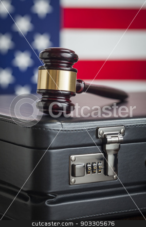 To use this stock image in your creative project, please select the size you need over to the right and click the "Add to Cart" button.
Your downloaded image will come with the Cutcaster watermark removed so don’t worry about the watermark you see on this page. Briefcase and Gavel Resting on Table with American Flag Behind stock photo, Leather Briefcase and Gavel Resting on Table with American Flag Behind. by Andy Dean