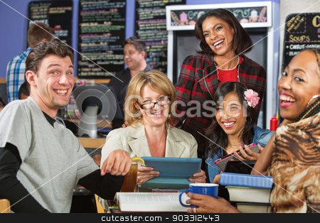 To use this stock image in your creative project, please select the size you need over to the right and click the "Add to Cart" button.
Your downloaded image will come with the Cutcaster watermark removed so don’t worry about the watermark you see on this page. Students Laughing stock photo, Diverse group of students laughing in coffee house by Scott Griessel